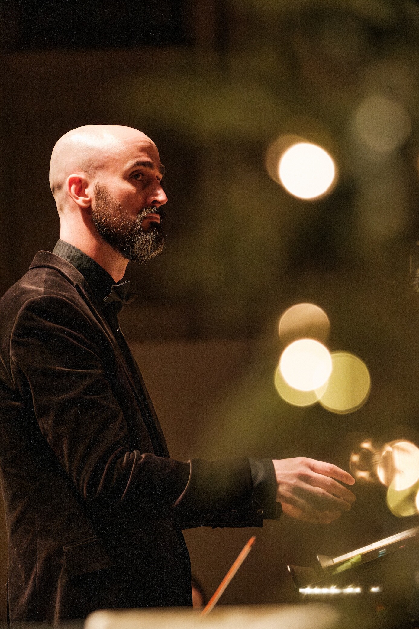 A conductor leads Boise Phil during Handel’s Messiah.