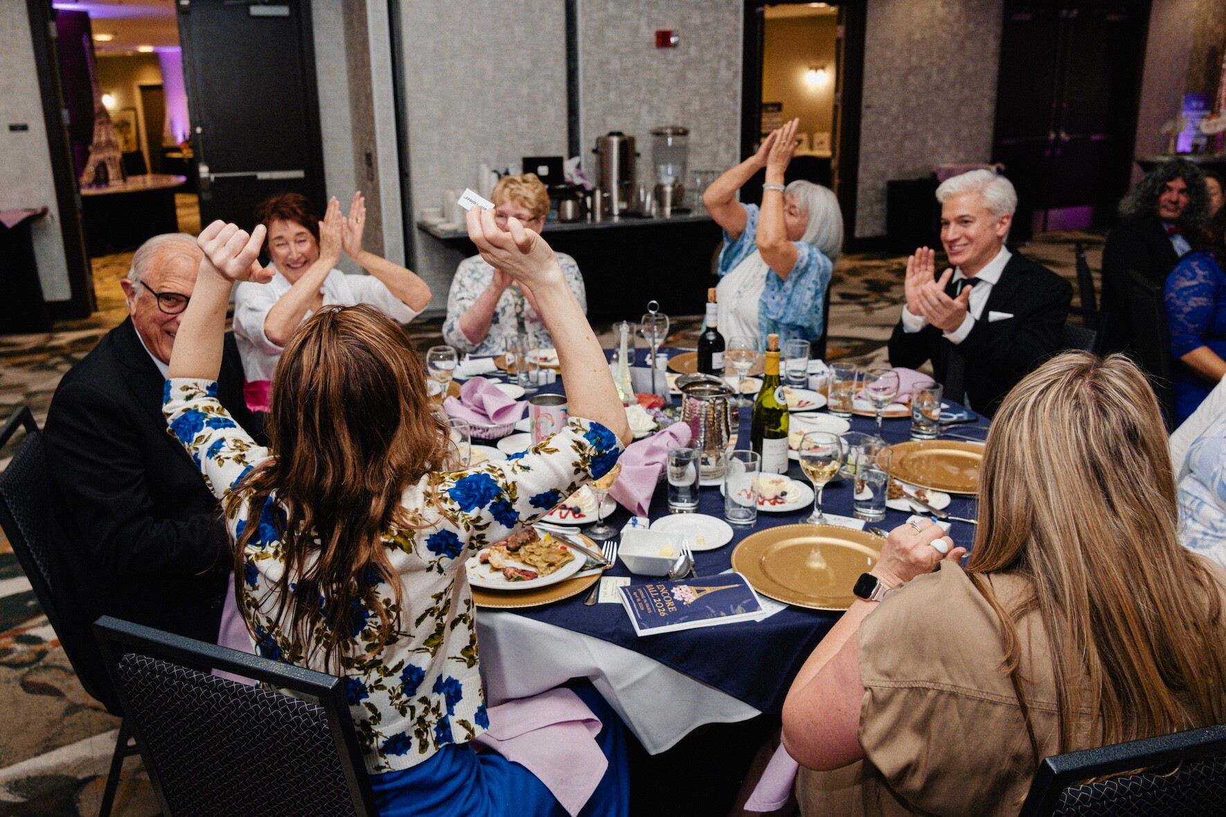 Guests celebrate around a table at Boise Phil’s Encore Ball.