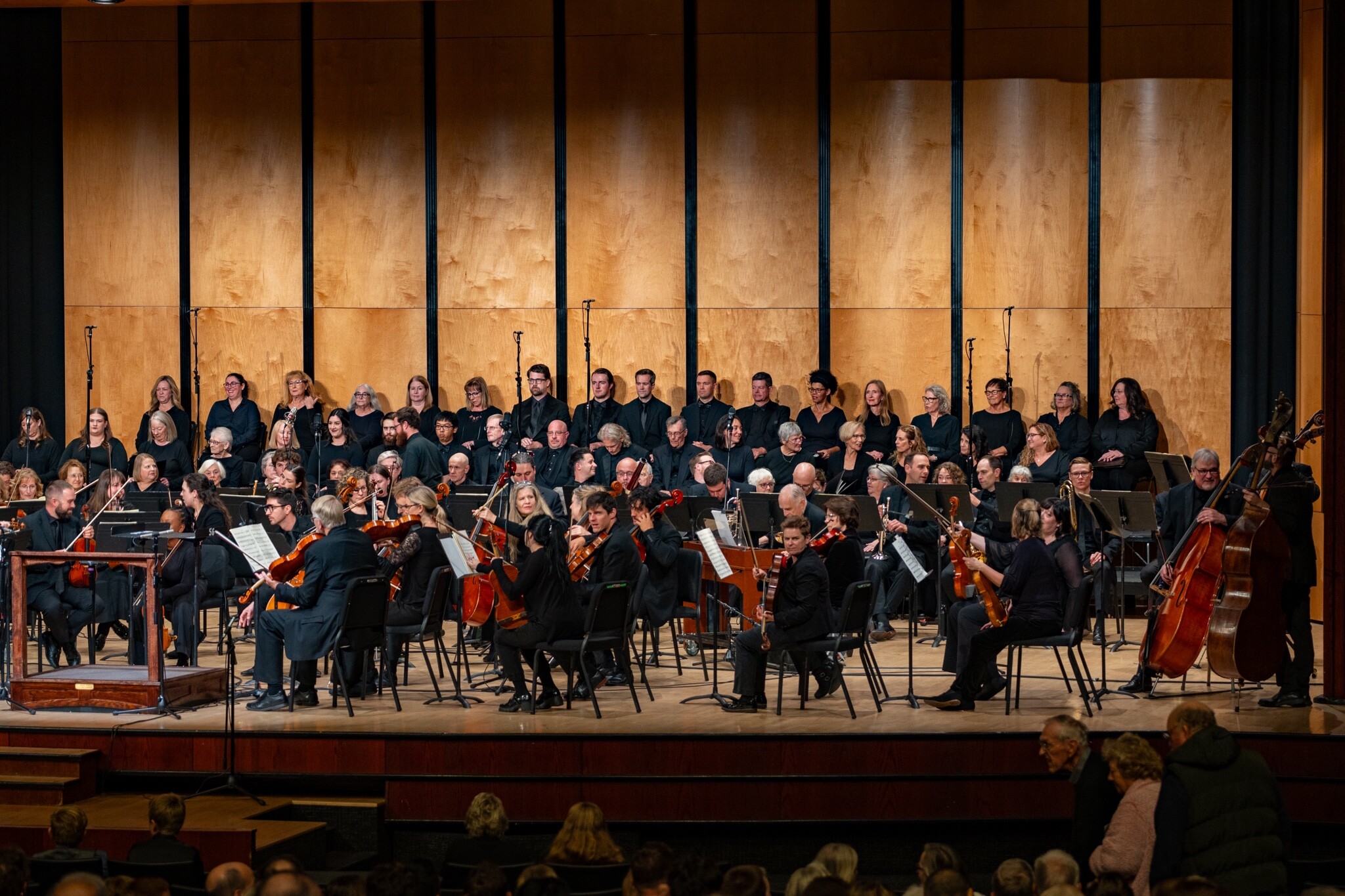 Boise Phil orchestra and Master Chorale perform together on stage.