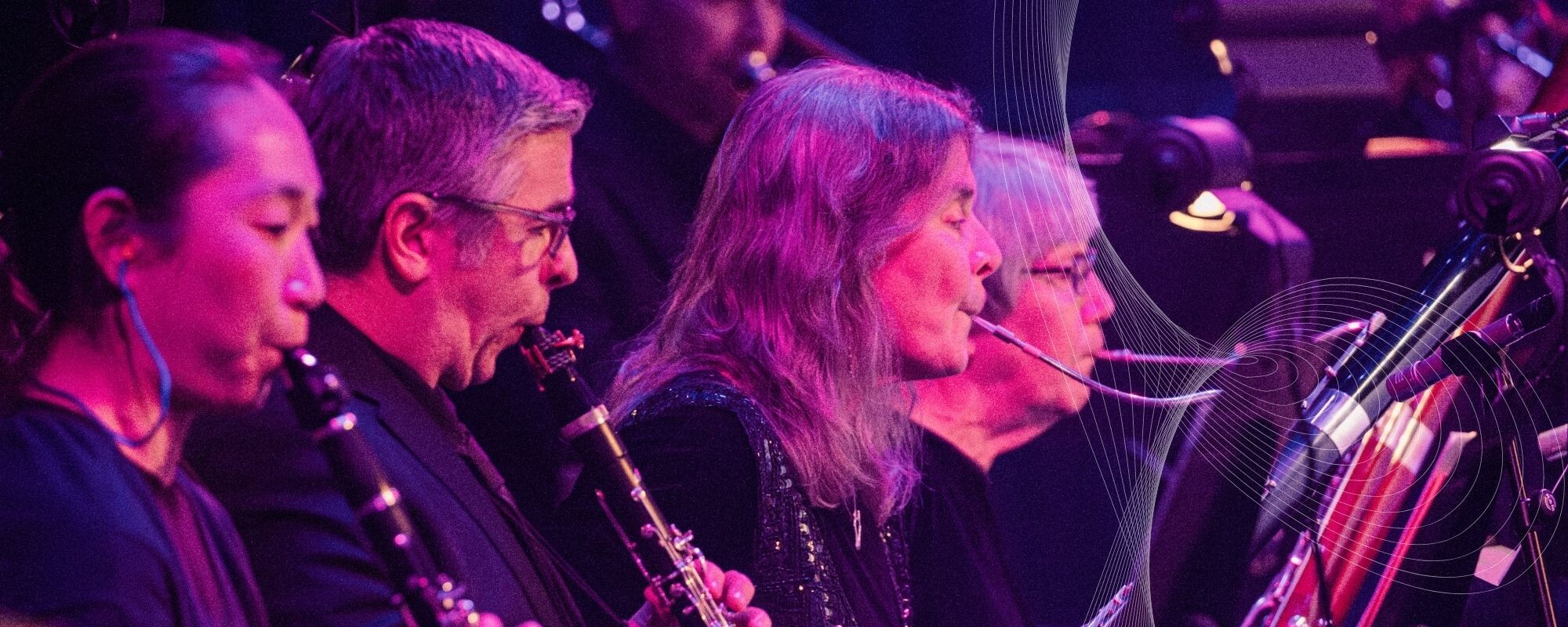 Boise Phil woodwind musicians perform together.